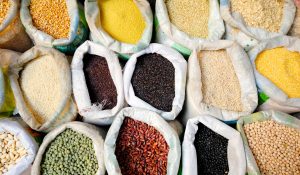 Sacks of healthy legumes and grains.